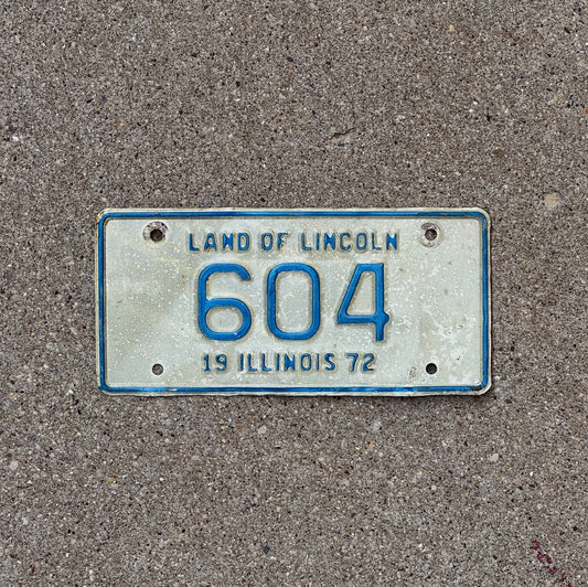 Photo of a 1972 Illinois Motorcycle License Plate Auto Tag Garage Decor Vintage Low Number Three Digit 604 with original patina