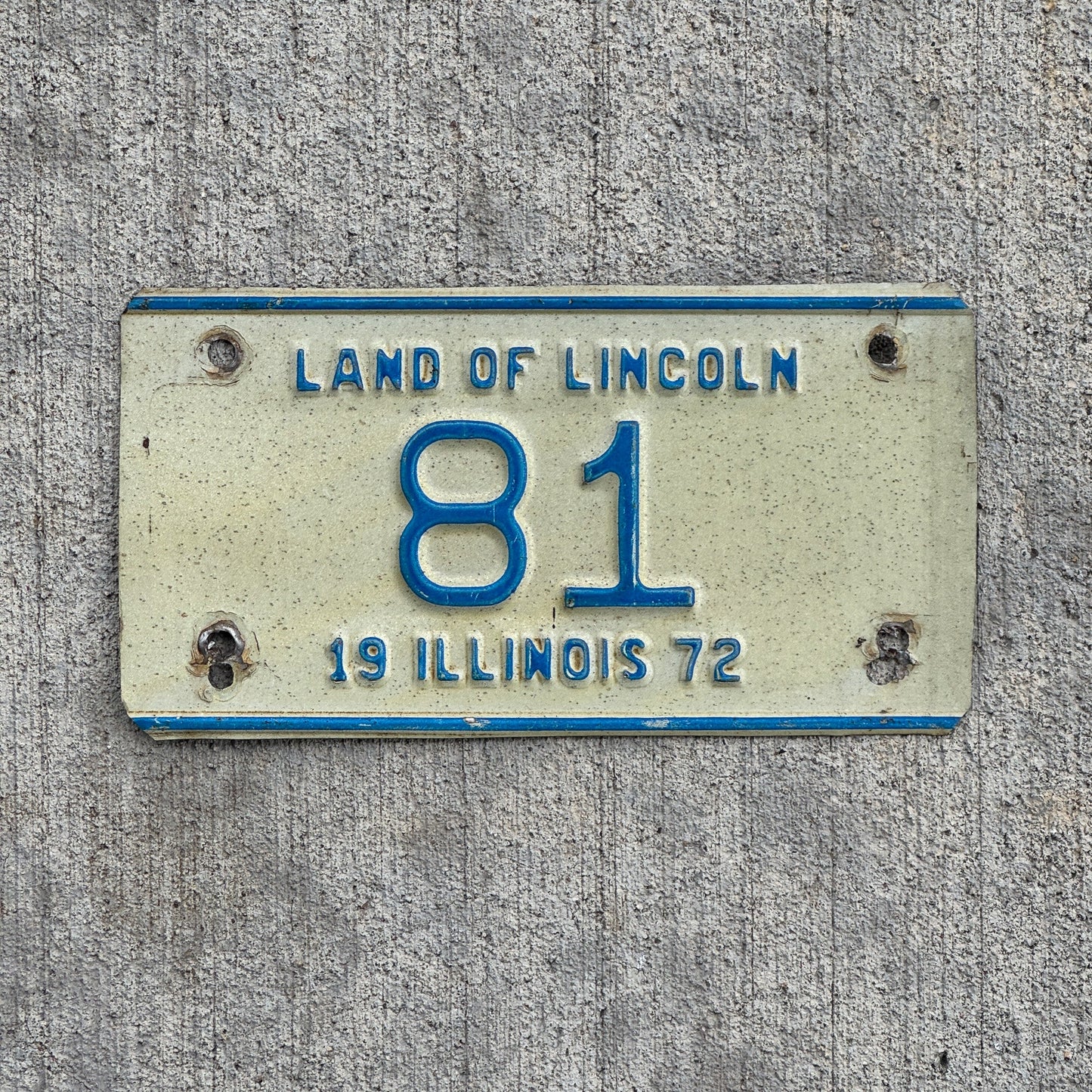 Photo of a 1972 Illinois Motorcycle License Plate Auto Tag Garage Decor Vintage Low Number Two Digit 81 with original patina