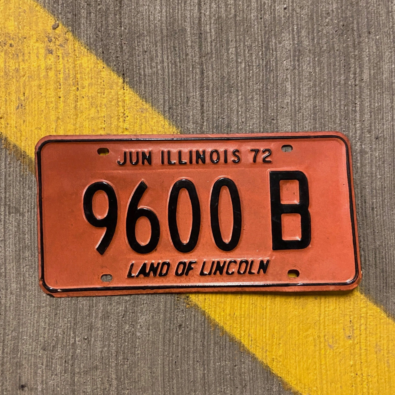 Photo of a 1972 Illinois Truck License Plate Auto Tag Garage Decor Vintage 9600 B with original patina