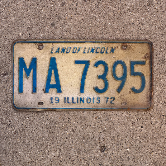 Photo of a 1972 Illinois Truck Mileage Tax License Plate Auto Tag Garage Decor Vintage MA 7395 with original patina