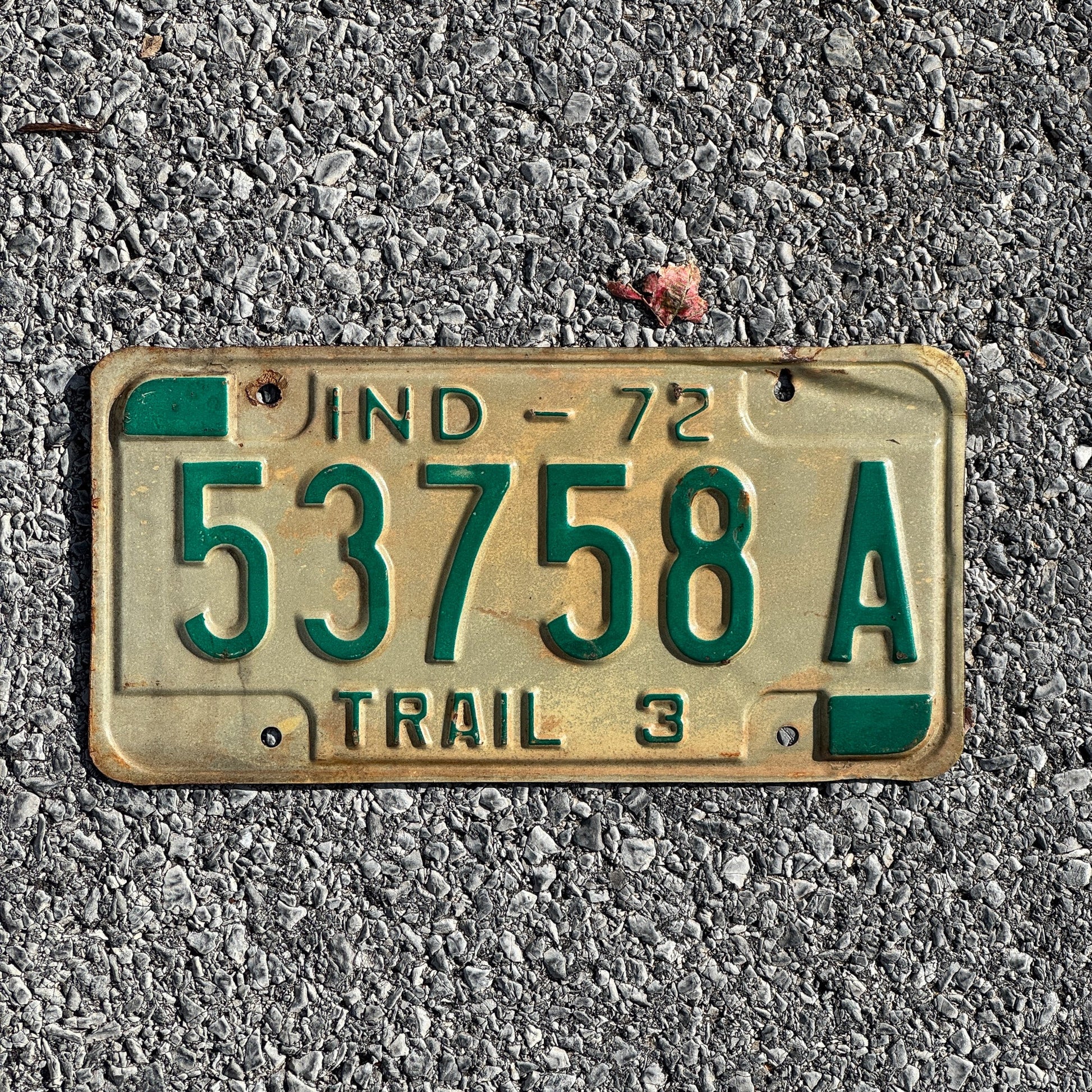 Photo of a 1972 Indiana Trailer License Plate Auto Tag Garage Decor Vintage 53758A