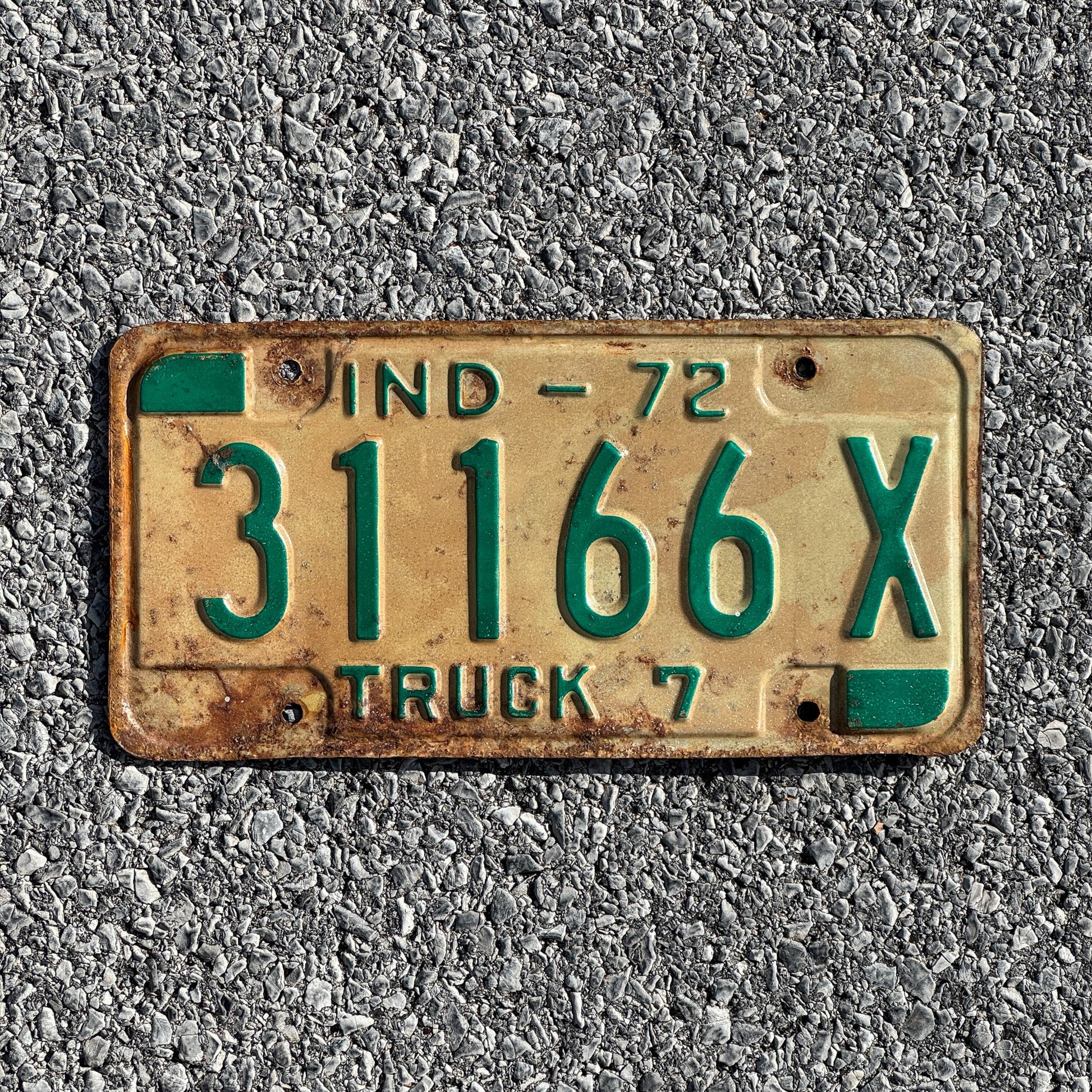 Photo of a 1972 Indiana Truck License Plate Auto Tag Garage Decor Vintage 31166X