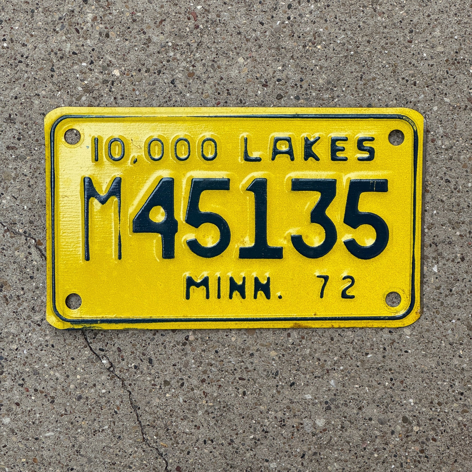 Photo of a 1972 Minnesota Motorcycle License Plate Auto Tag Garage Decor Vintage M 45135 with original patina
