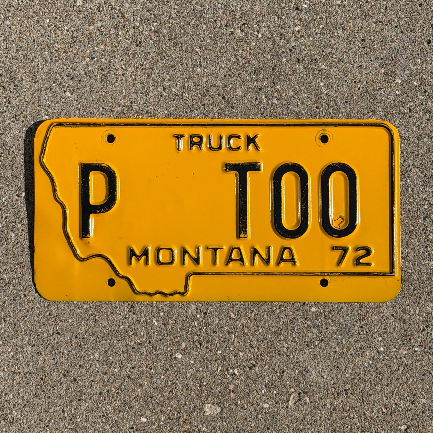 Photo of a 1972 Montana Prorate Power License Plate Auto Tag 1 Vintage State Shape Sample? P T00 with original patina