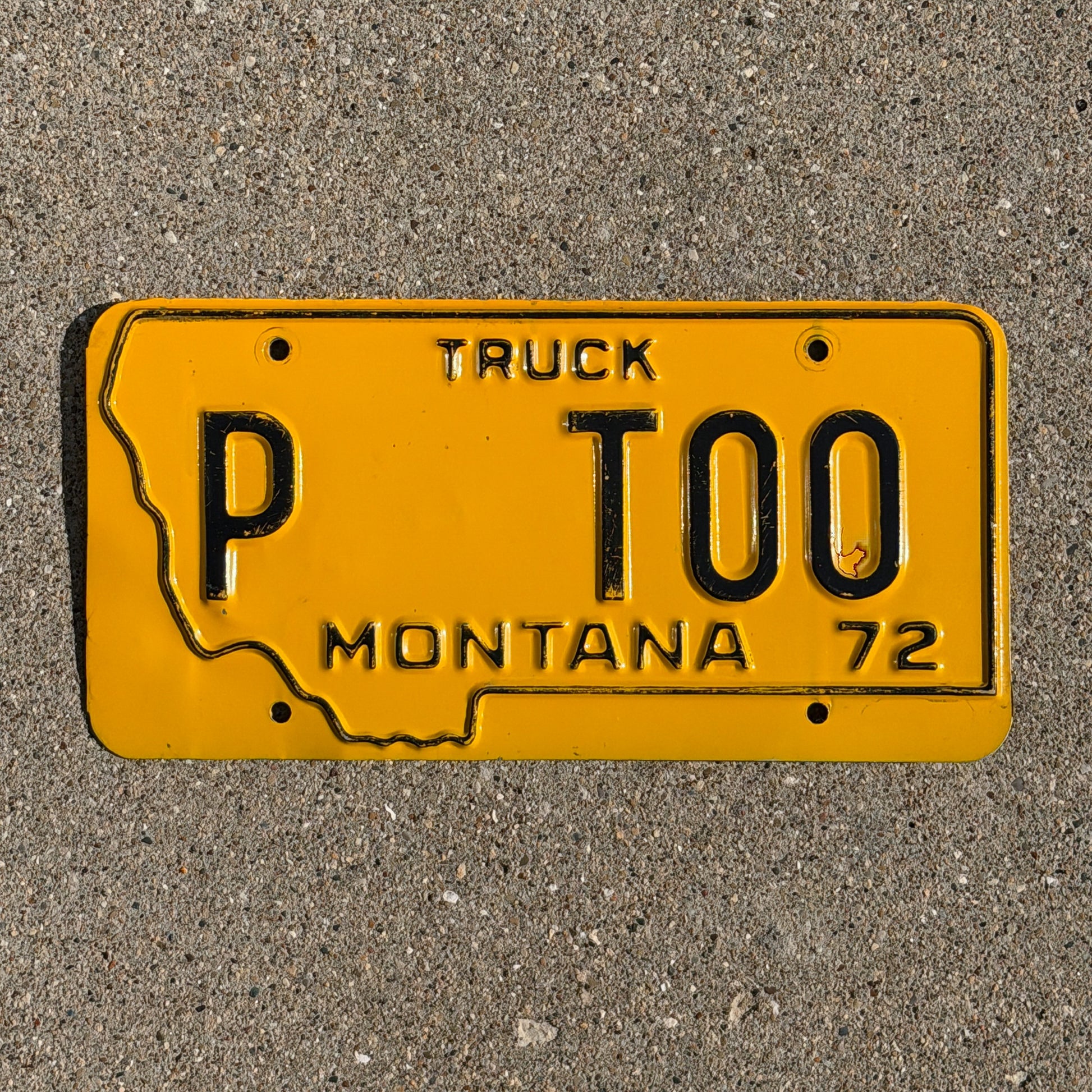 Photo of a 1972 Montana Prorate Power License Plate Auto Tag 1 Vintage State Shape Sample? P T00 with original patina