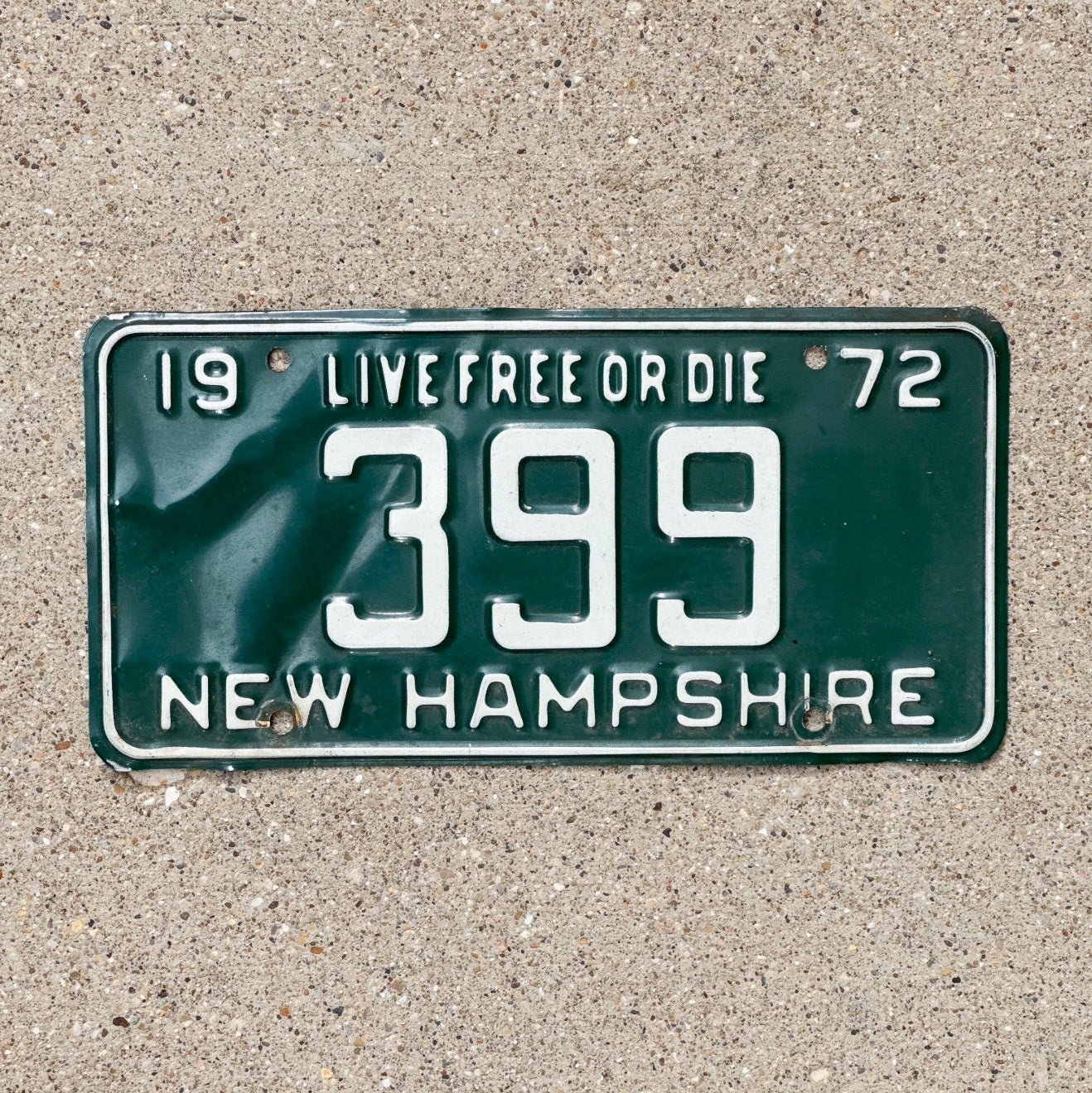 Photo of a 1972 New Hampshire License Plate Auto Tag 2 Vintage Garage Low Number Three Digit 399 with original patina