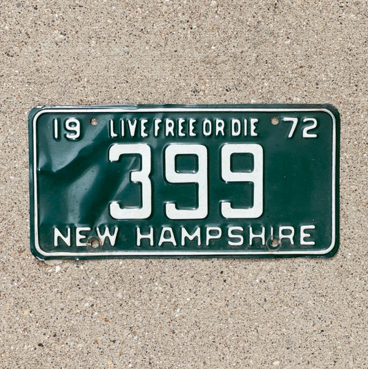 Photo of a 1972 New Hampshire License Plate Auto Tag 2 Vintage Garage Low Number Three Digit 399 with original patina