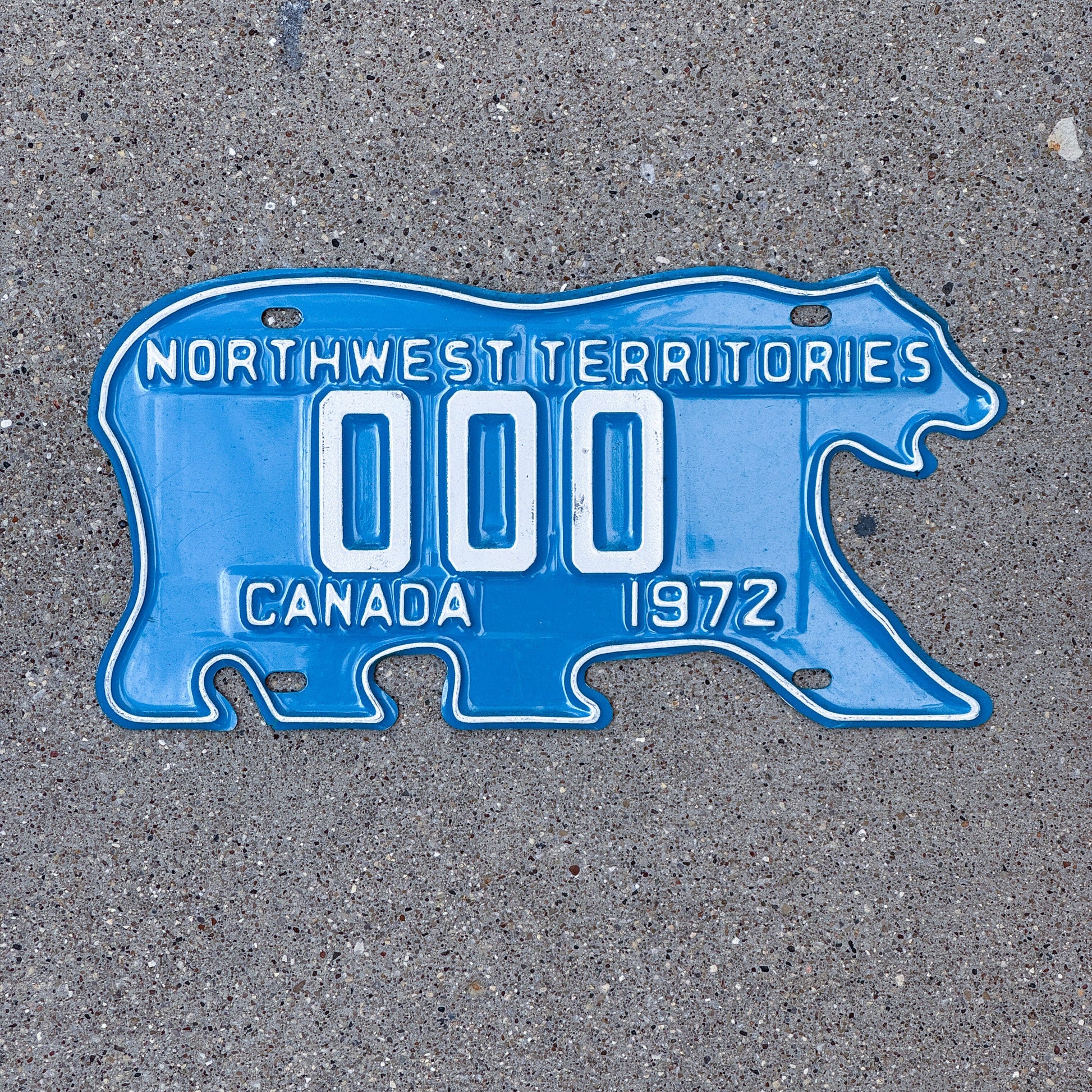 Photo of a 1972 Northwest Territories Sample License Plate Auto Tag Garage Decor Vintage Polar Bear 000