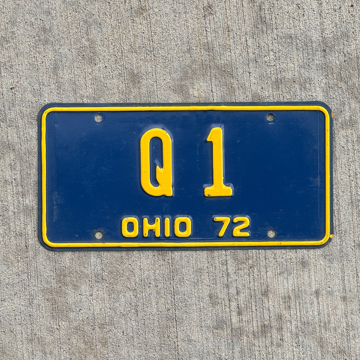 Photo of a 1972 Ohio License Plate Auto Tag 1 Vintage Garage Low Number Q 1 with original patina