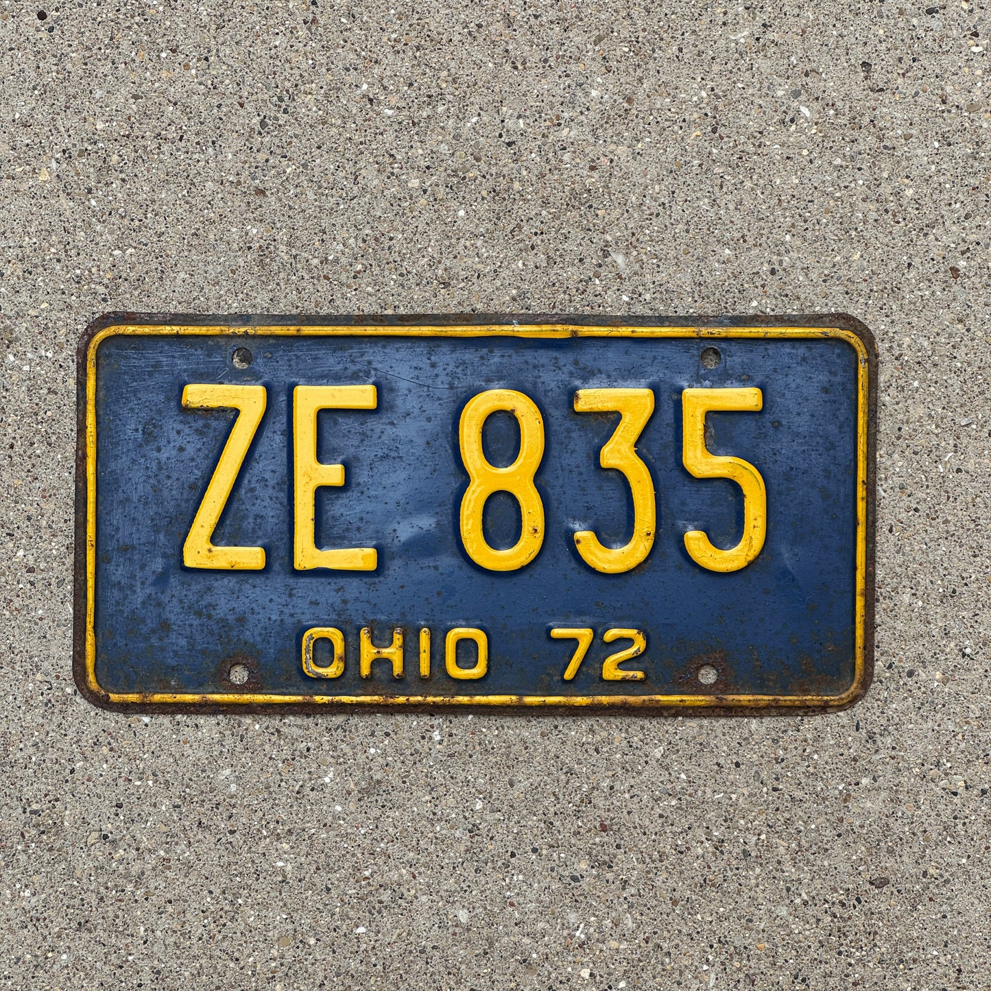 Photo of a 1972 Ohio License Plate Auto Tag 2 Vintage Garage ZE 835 with original patina