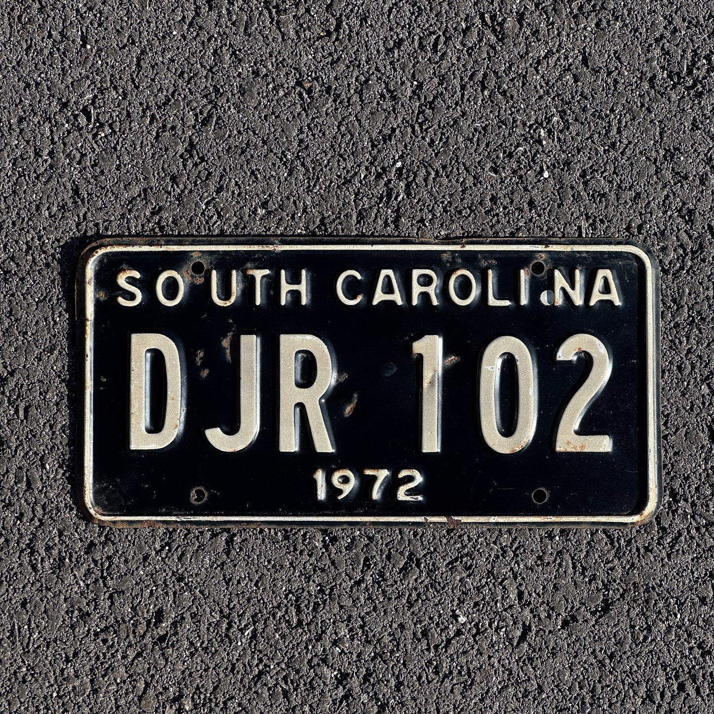 Photo of a 1972 South Carolina License Plate Auto Tag Garage Decor Vintage DJR 102 with original patina