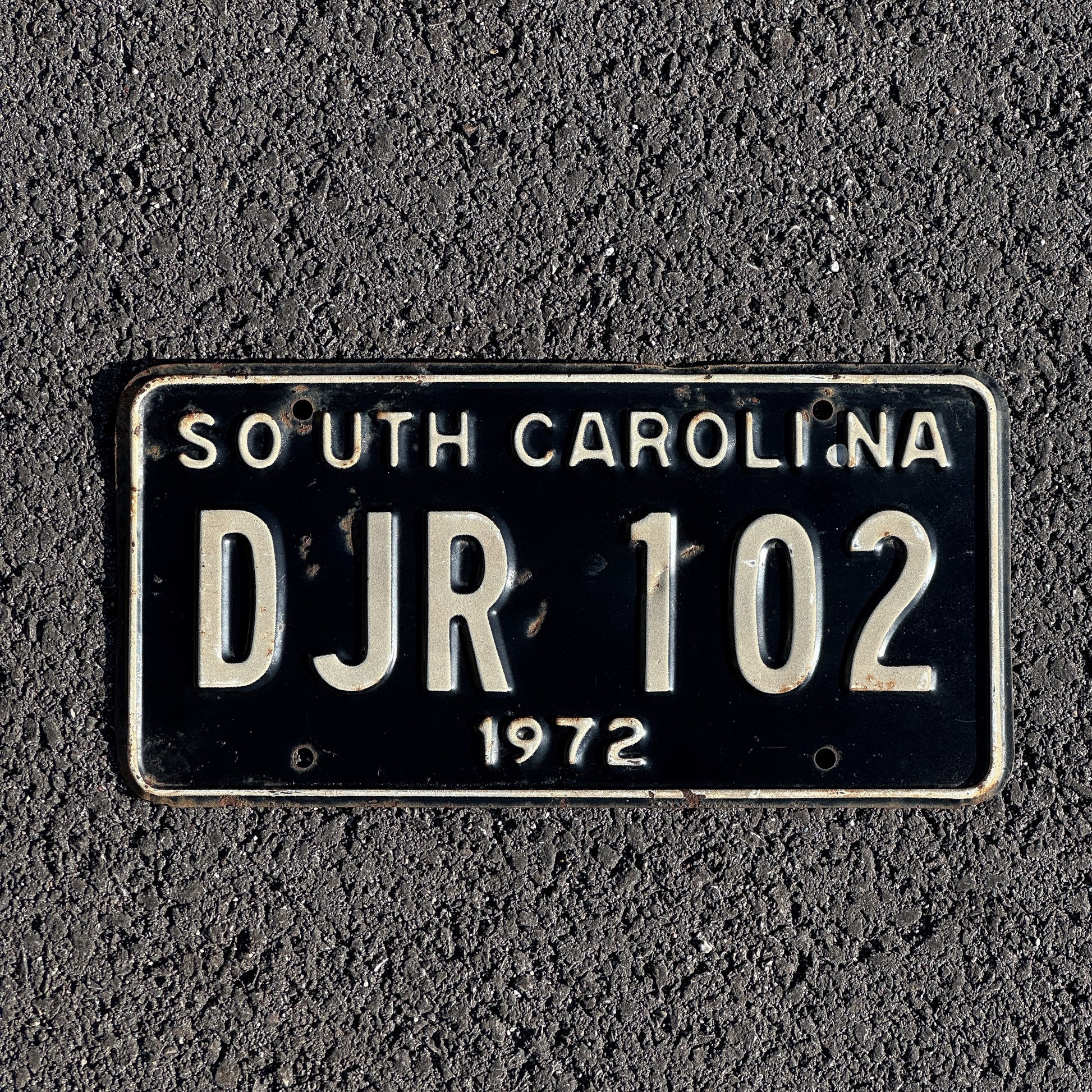Photo of a 1972 South Carolina License Plate Auto Tag Garage Decor Vintage DJR 102 with original patina