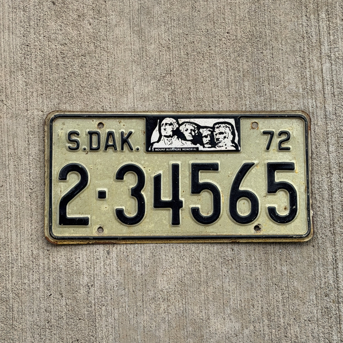 Photo of a 1972 South Dakota License Plate Auto Tag Garage Decor Vintage Mt. Rushmore 2 34565 with original patina