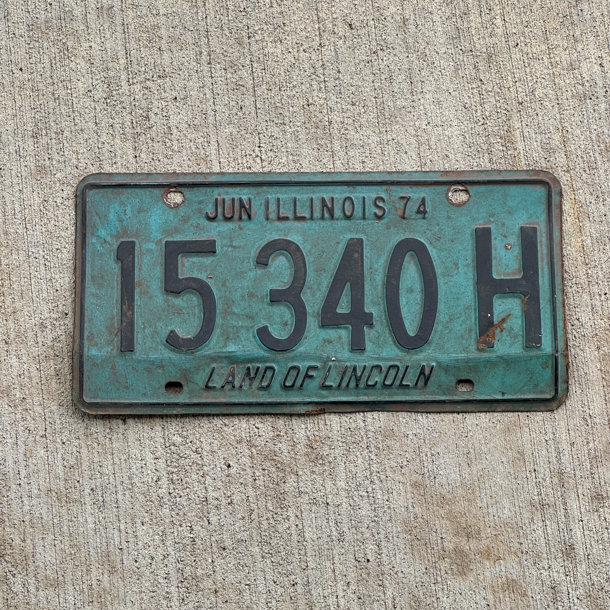 Photo of a 1973 1974 Illinois Truck License Plate Auto Tag 2 Vintage Garage 15 340 H with original patina