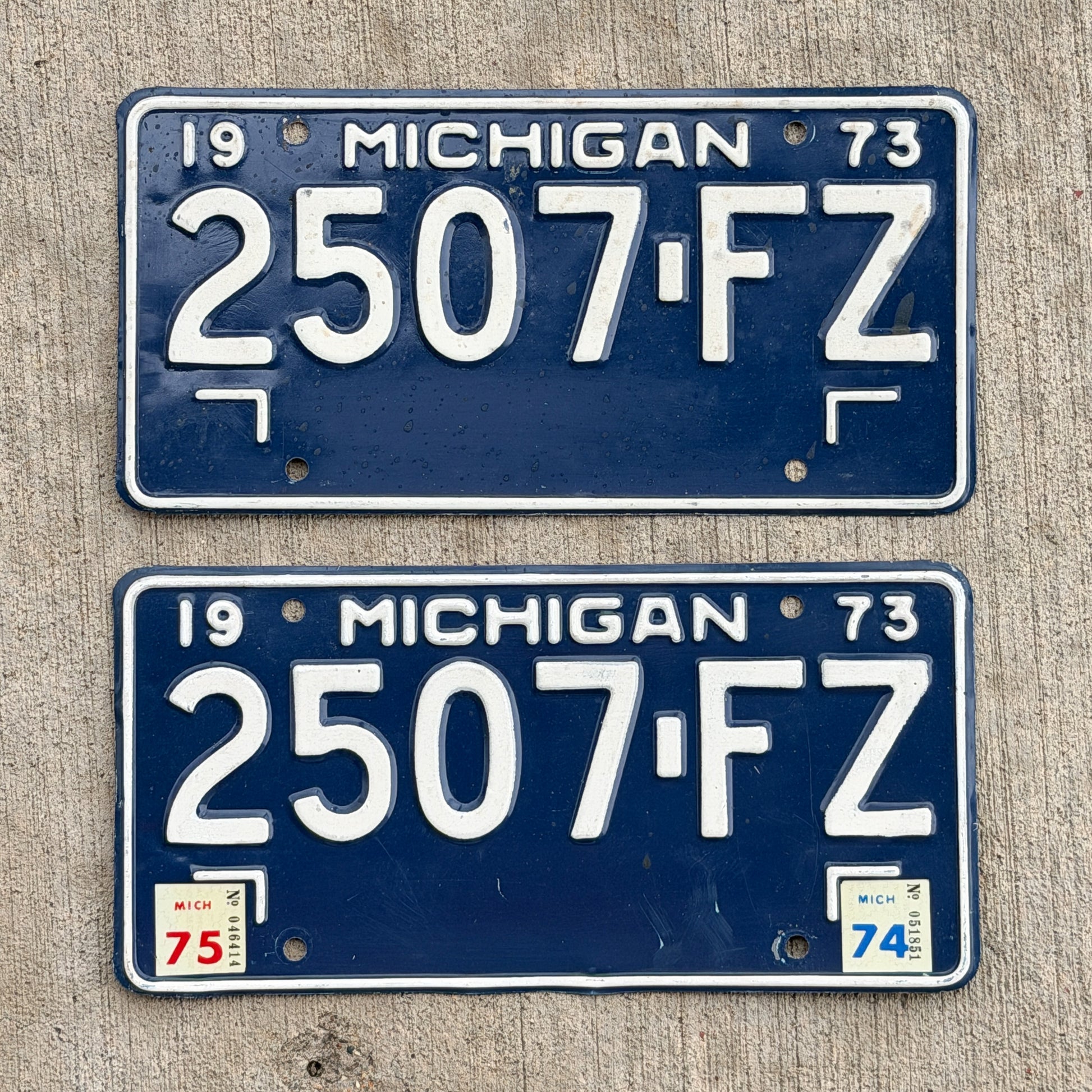 Photo of a 1973 1974 Michigan Commercial License Plate Pair Auto Tag Garage Decor Vintage 2507 FZ with original patina