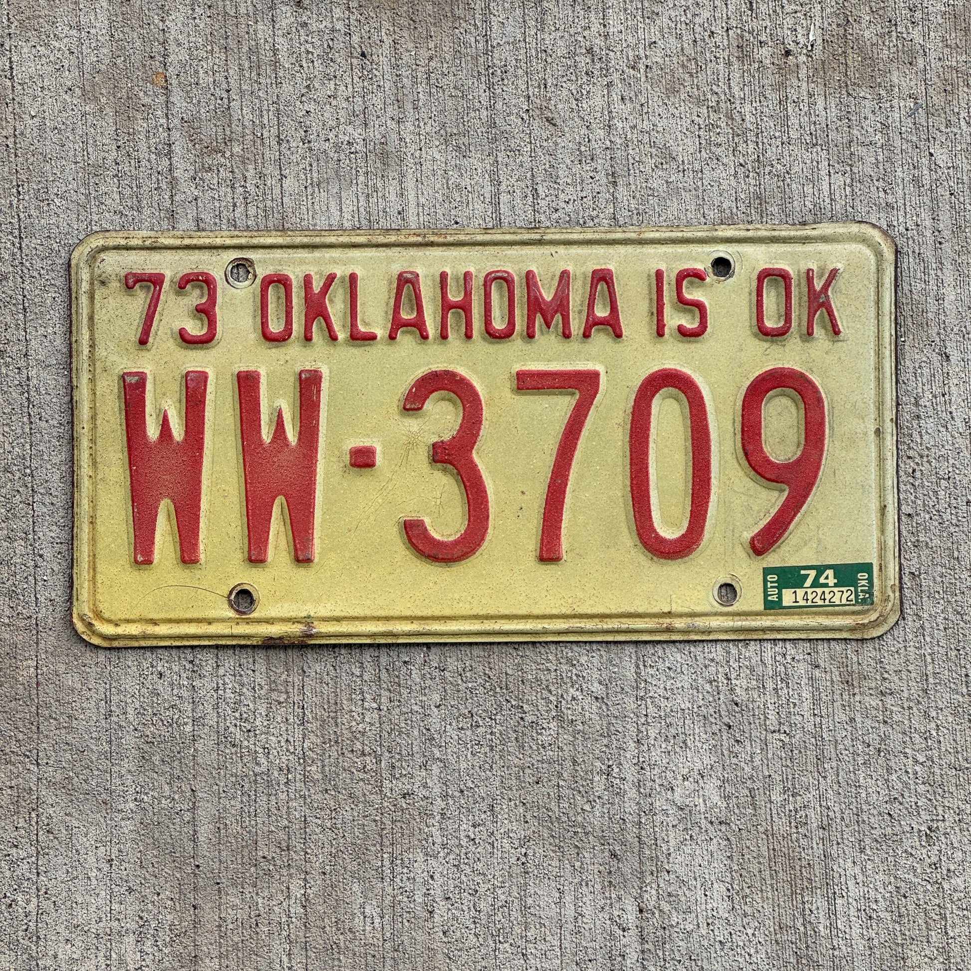 Photo of a 1973 1974 Oklahoma License Plate Auto Tag Garage Decor Vintage WW 3709 with original patina
