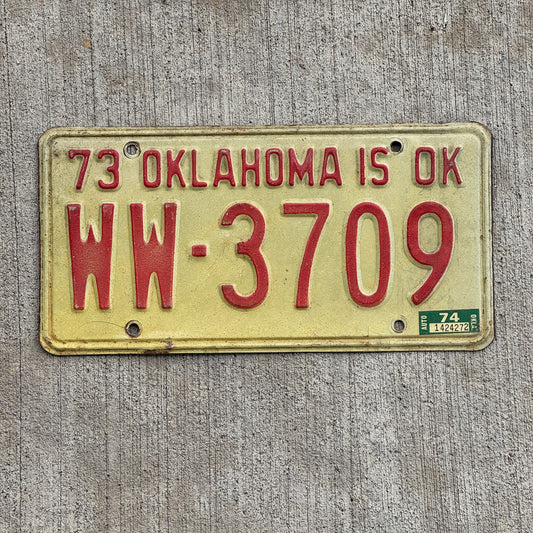 Photo of a 1973 1974 Oklahoma License Plate Auto Tag Garage Decor Vintage WW 3709 with original patina