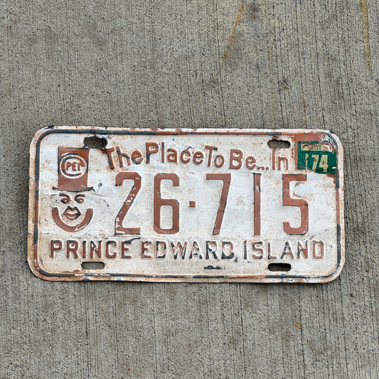 Photo of a 1973 1974 Prince Edward Island License Plate Auto Tag Garage Decor Vintage PEI Father of Confederation Graphic 26 715 with original patina