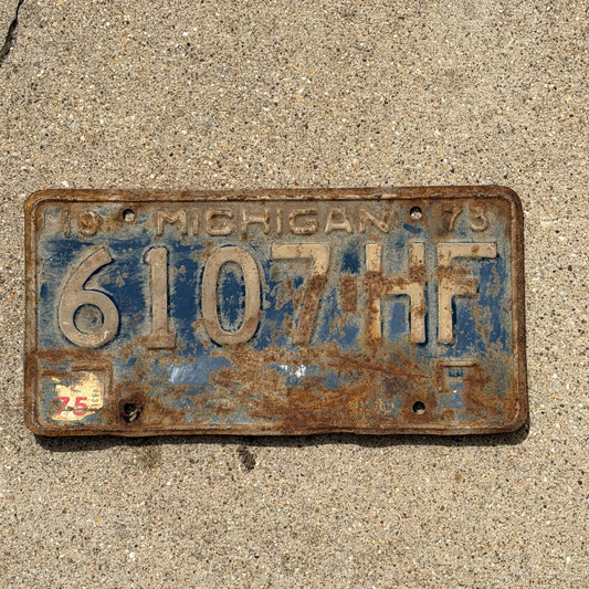 Photo of a 1973 1975 Michigan Commercial License Plate Auto Tag Garage Decor Vintage 6107 HF with original patina