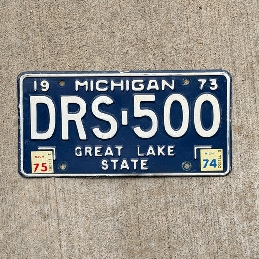 Photo of a 1973 1975 Michigan License Plate Auto Tag Garage Decor Vintage DRS 500 with original patina