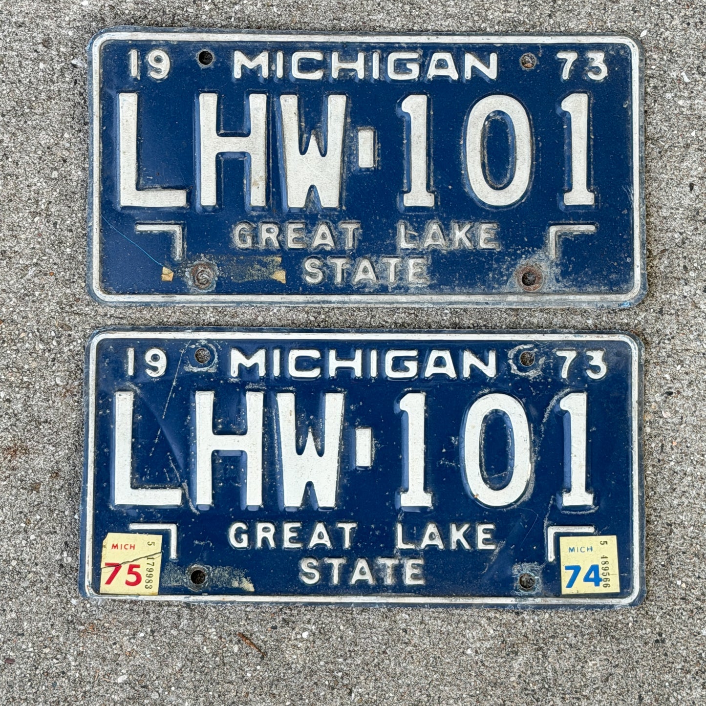 Photo of a 1973 1975 Michigan License Plate Pair Auto Tag Garage Decor Vintage LHW 101 with original patina