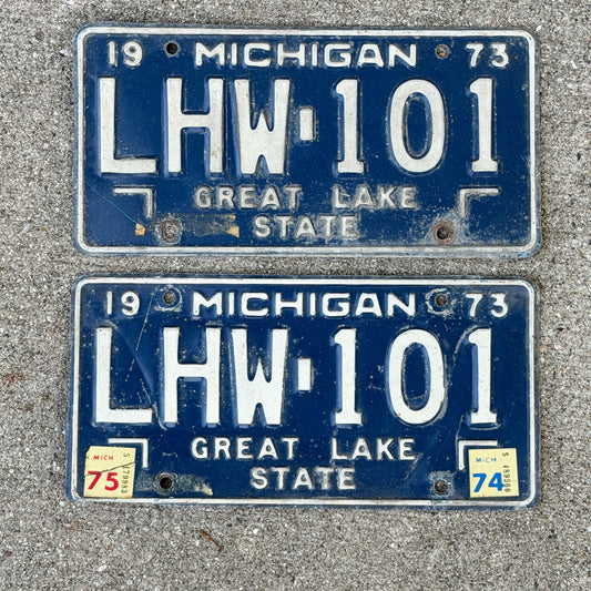 Photo of a 1973 1975 Michigan License Plate Pair Auto Tag Garage Decor Vintage LHW 101 with original patina