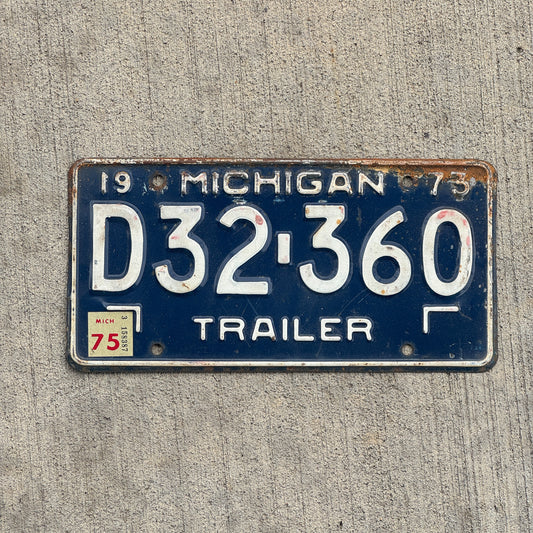 Photo of a 1973 1975 Michigan Trailer License Plate Auto Tag Garage Decor Vintage D32 360 with original patina