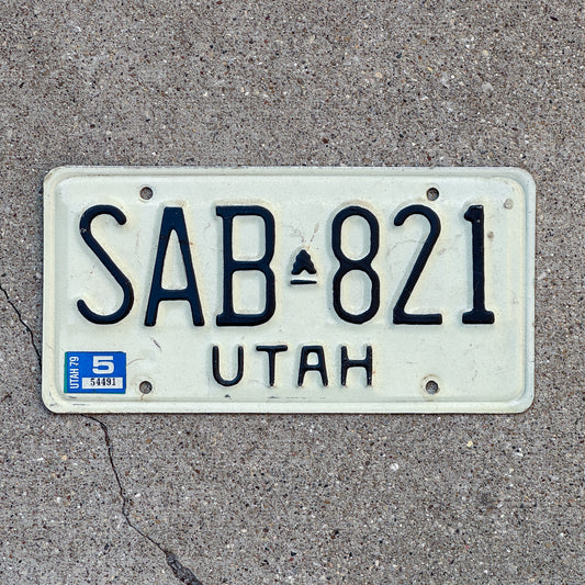 Photo of a 1973 1979 Utah License Plate Auto Tag Garage Decor Vintage SAB 821 with original patina