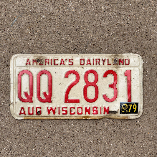 Photo of a 1973 1979 Wisconsin License Plate Auto Tag Garage Decor Vintage Dairyland QQ 2831