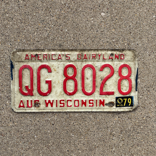 Photo of a 1973 1979 Wisconsin License Plate Auto Tag Garage Decor Vintage QG 8028 with original patina