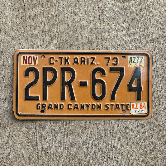 Photo of a 1973 1984 Arizona Commercial License Plate Auto Tag Garage Decor Vintage 2PR 674 with original patina