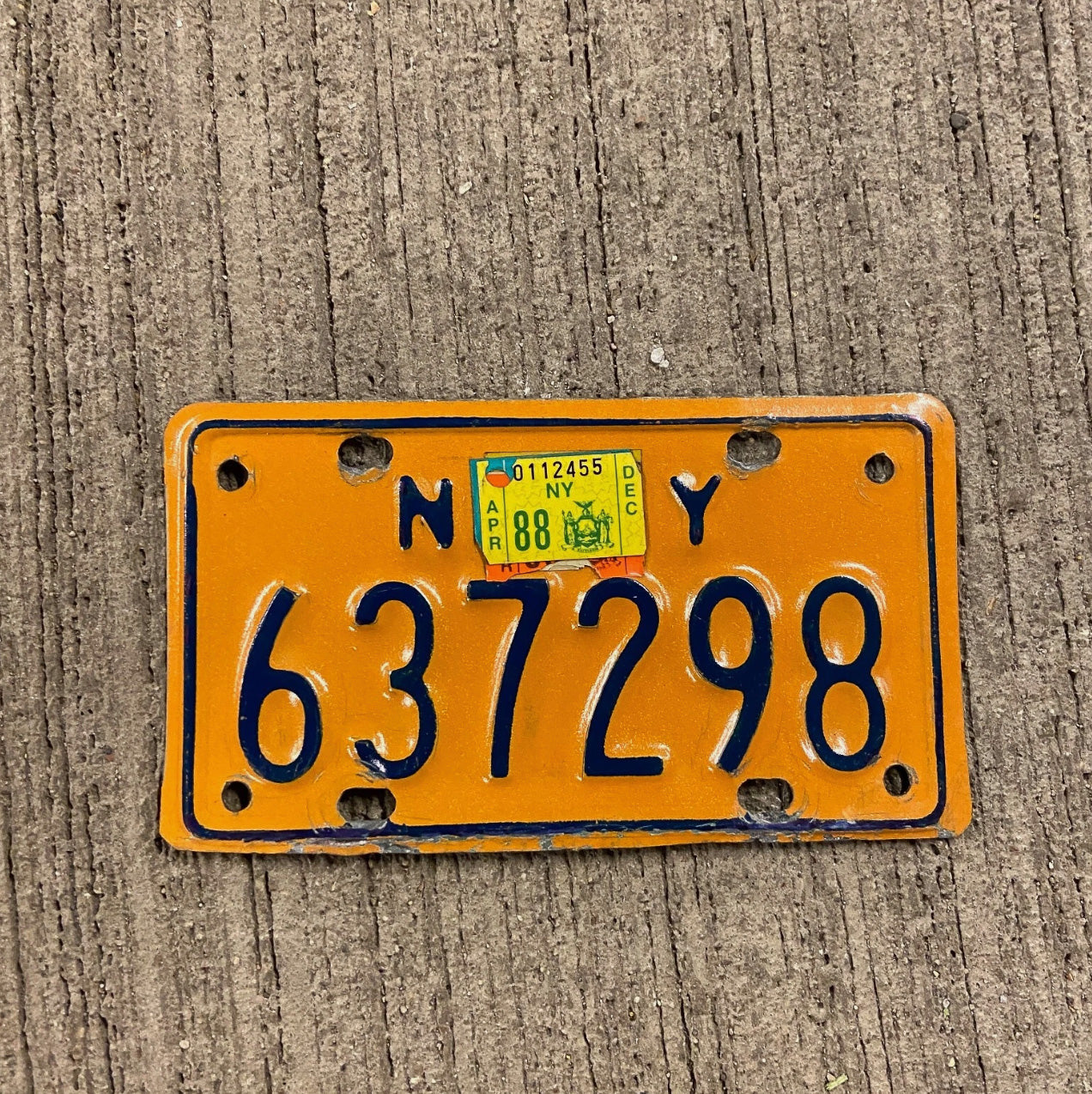 Photo of a 1973 1988 New York Motorcycle License Plate Auto Tag Garage Decor Vintage 637298 with original patina