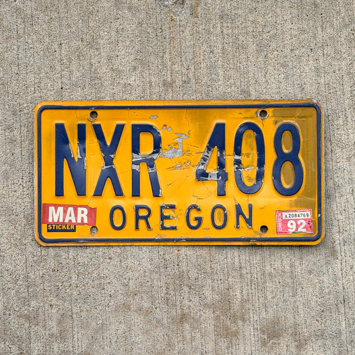 Photo of a 1973 1992 Oregon License Plate Auto Tag Garage Decor Vintage NXR 408 with original patina