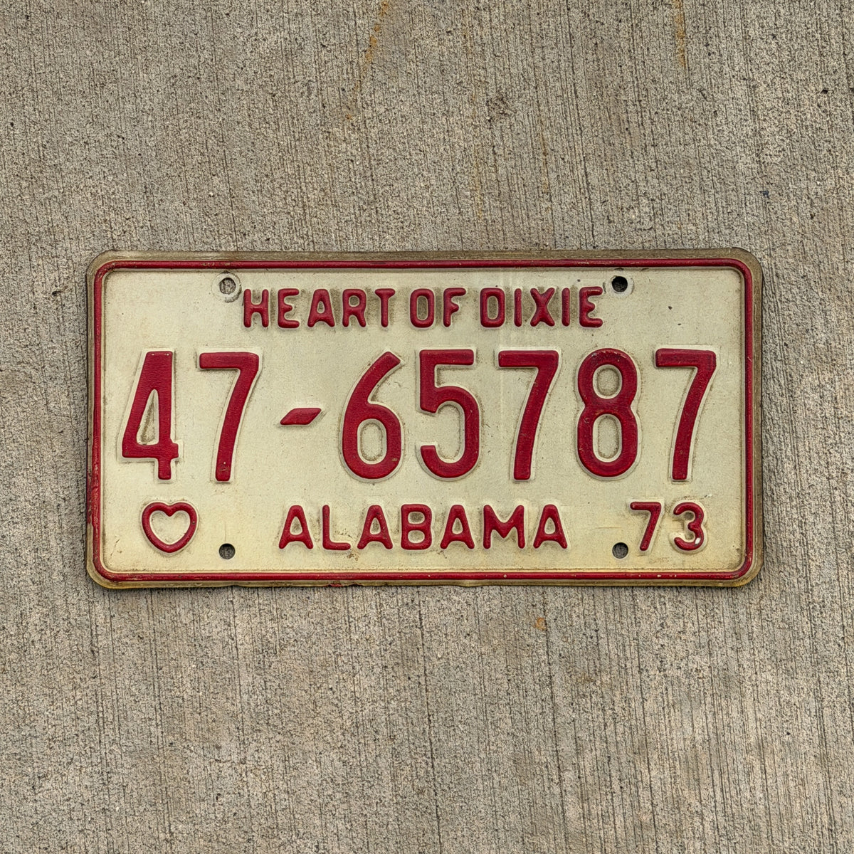 Photo of a 1973 Alabama License Plate Auto Tag Garage Decor Vintage 47 65787 with original patina