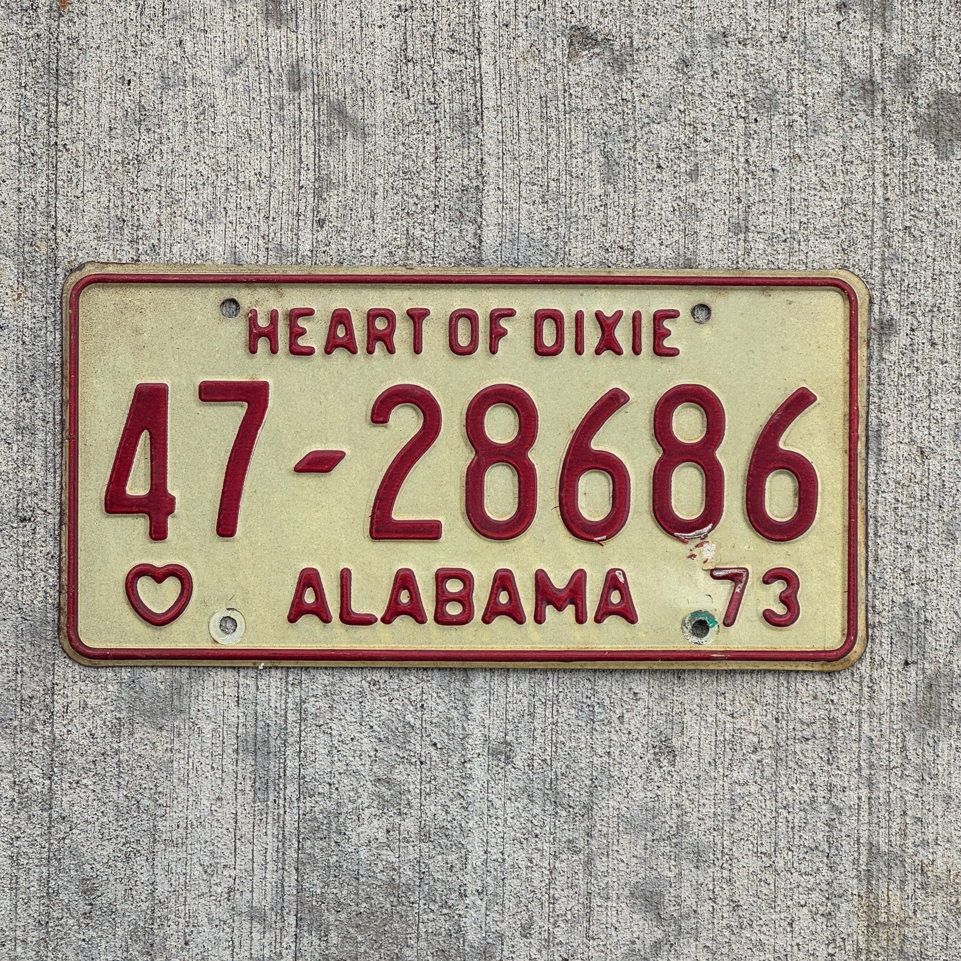 Photo of a 1973 Alabama License Plate Auto Tag Garage Decor Vintage Heart of Dixie 47 28686 with original patina