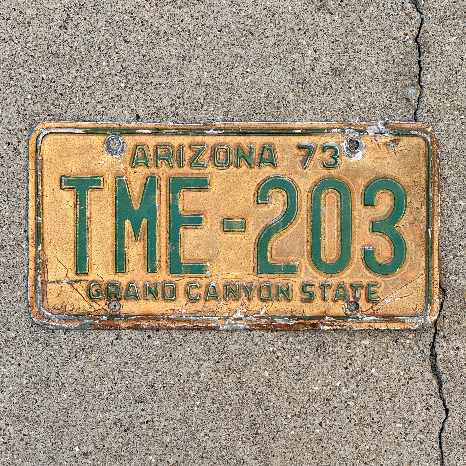 Photo of a 1973 Arizona License Plate Auto Tag Garage Decor Vintage TME 203 with original patina