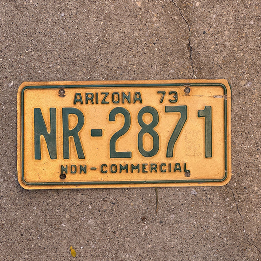 Photo of a 1973 Arizona Non Commercial License Plate Auto Tag Garage Decor Vintage NR 2871 with original patina