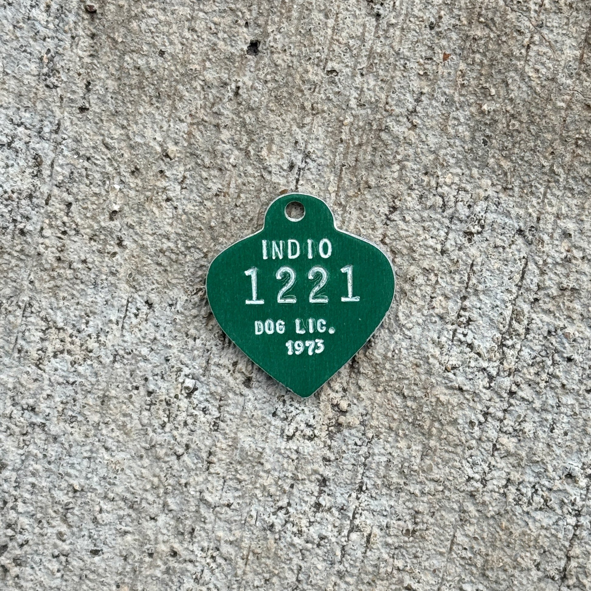 Photo of a 1973 California Dog License Auto Tag Garage Decor Vintage Indio 1221 with original patina