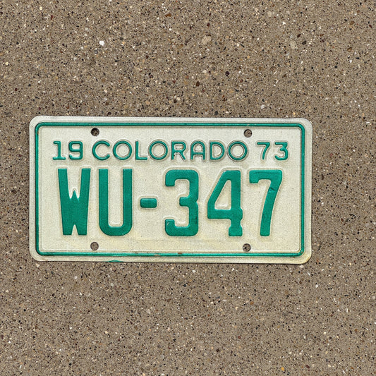 Photo of a 1973 Colorado Motorcycle License Plate Auto Tag Garage Decor Vintage WU 347