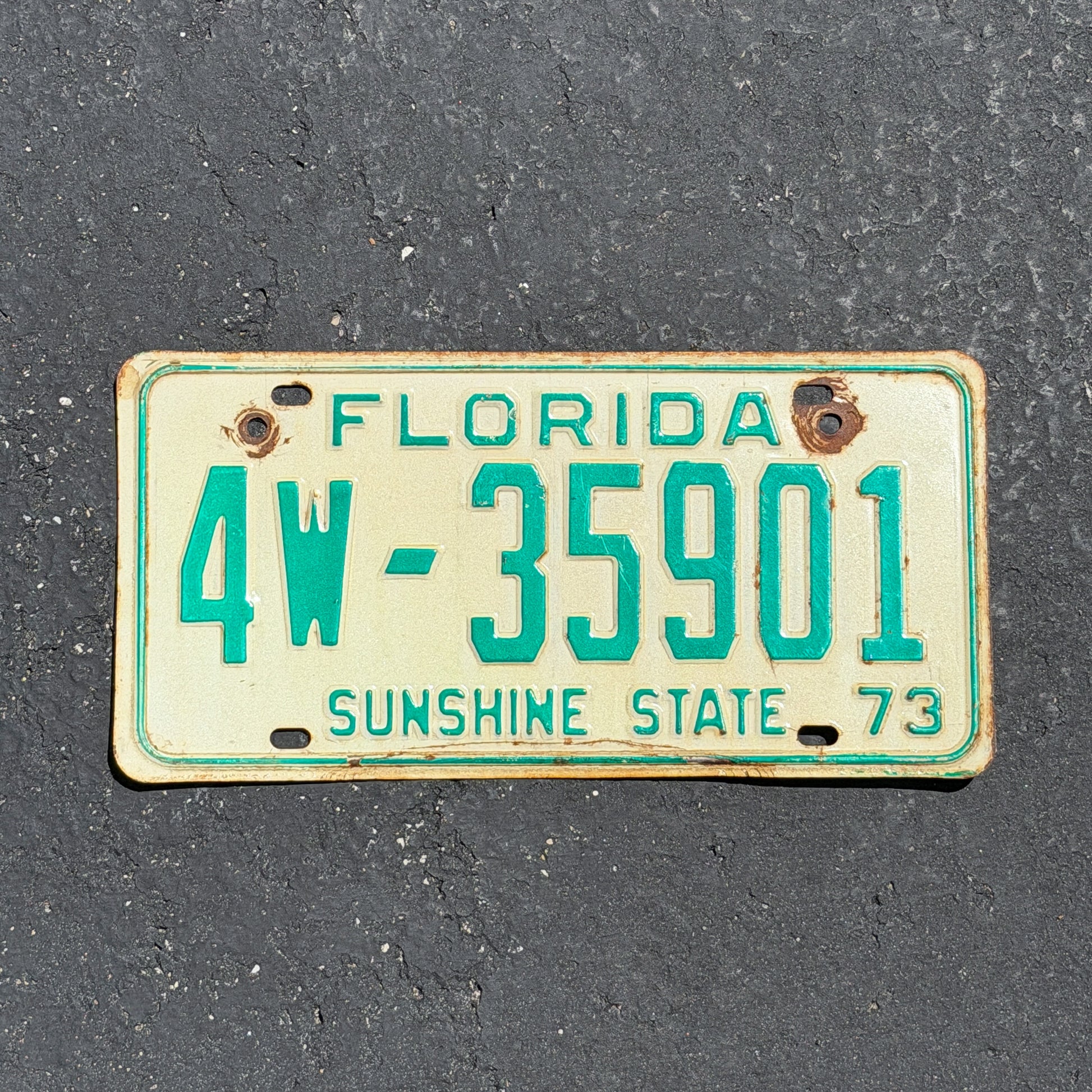 Photo of a 1973 Florida License Plate Auto Tag Garage Decor Vintage 4W 35901 with original patina