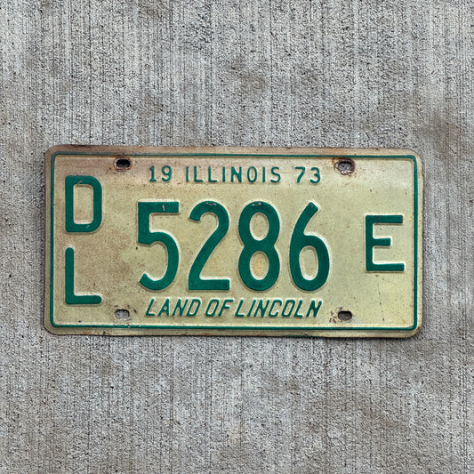 Photo of a 1973 Illinois Dealer License Plate Auto Tag 1 Vintage Garage 5286 E with original patina