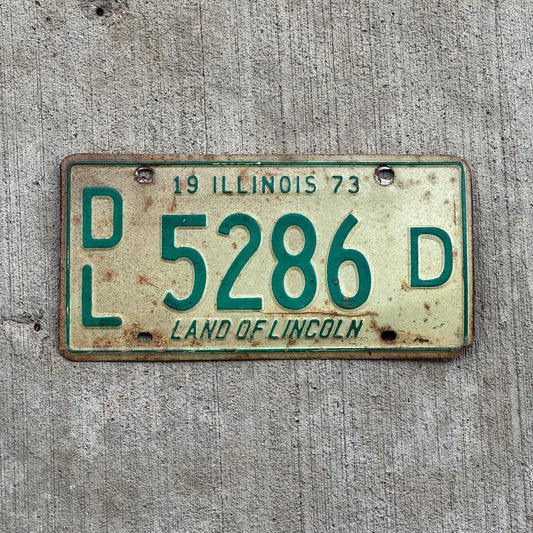 Photo of a 1973 Illinois Dealer License Plate Auto Tag 2 Vintage Garage 5286 D with original patina