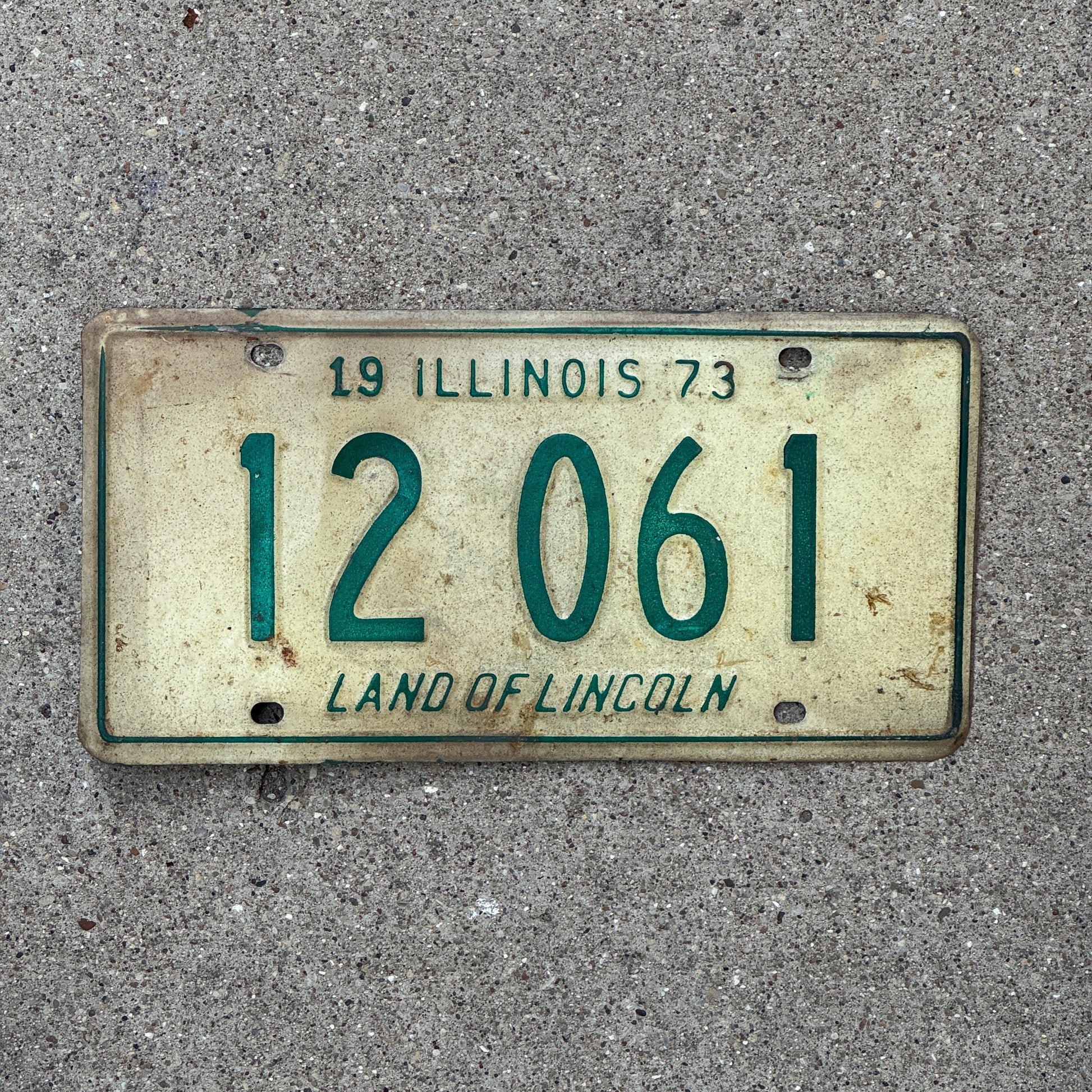 Photo of a 1973 Illinois License Plate Auto Tag 1 Vintage Garage 12 061 with original patina