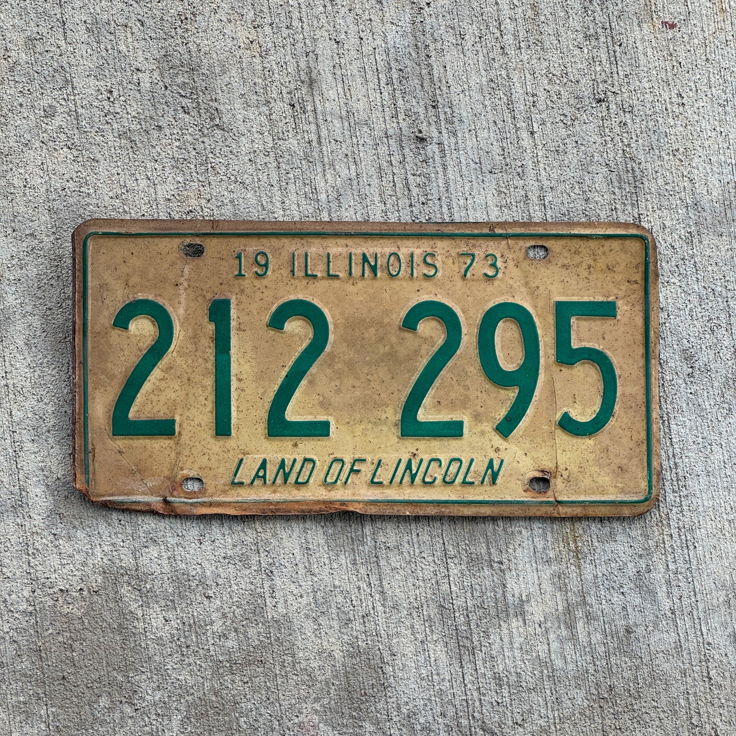 Photo of a 1973 Illinois License Plate Auto Tag 1 Vintage Garage 212 295 with original patina