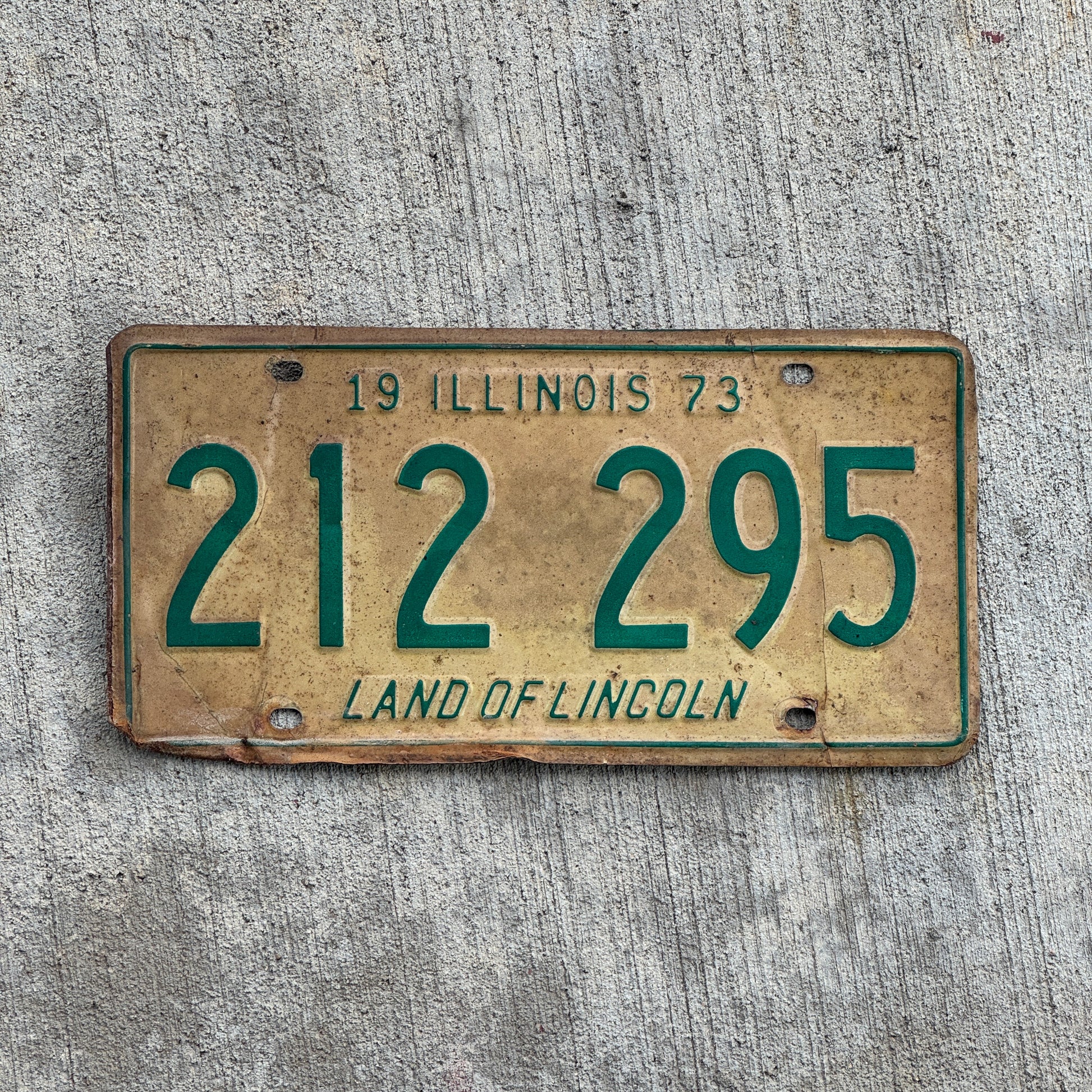Photo of a 1973 Illinois License Plate Auto Tag 1 Vintage Garage 212 295 with original patina
