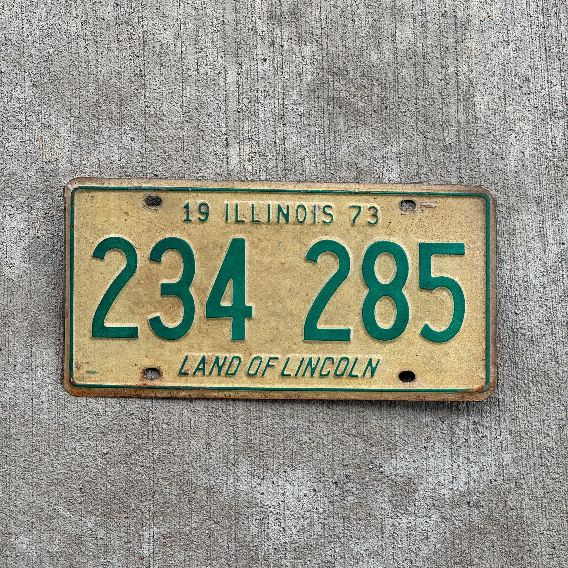 Photo of a 1973 Illinois License Plate Auto Tag 1 Vintage Garage 234 285 with original patina