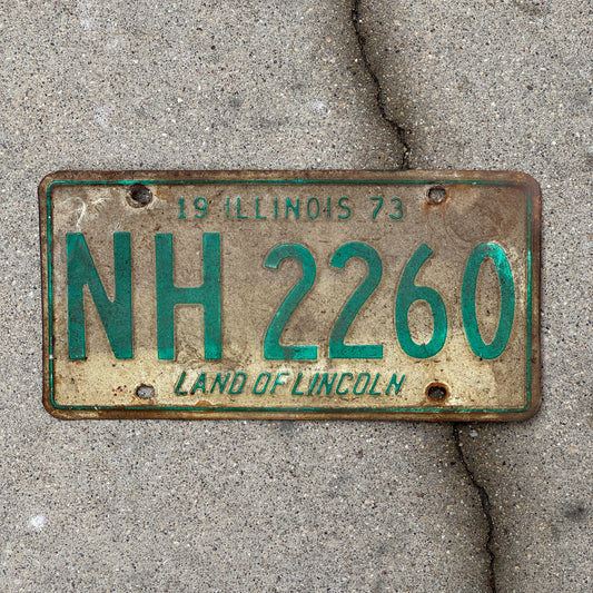 Photo of a 1973 Illinois License Plate Auto Tag 1 Vintage Garage NH 2260 with original patina