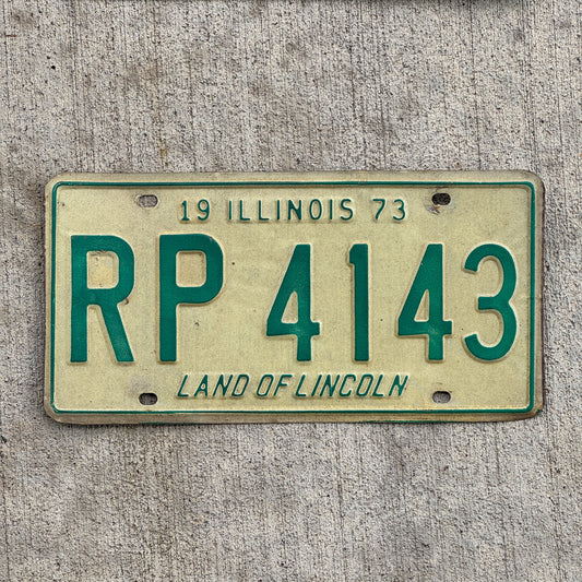 Photo of a 1973 Illinois License Plate Auto Tag 1 Vintage Garage RP 4143 with original patina