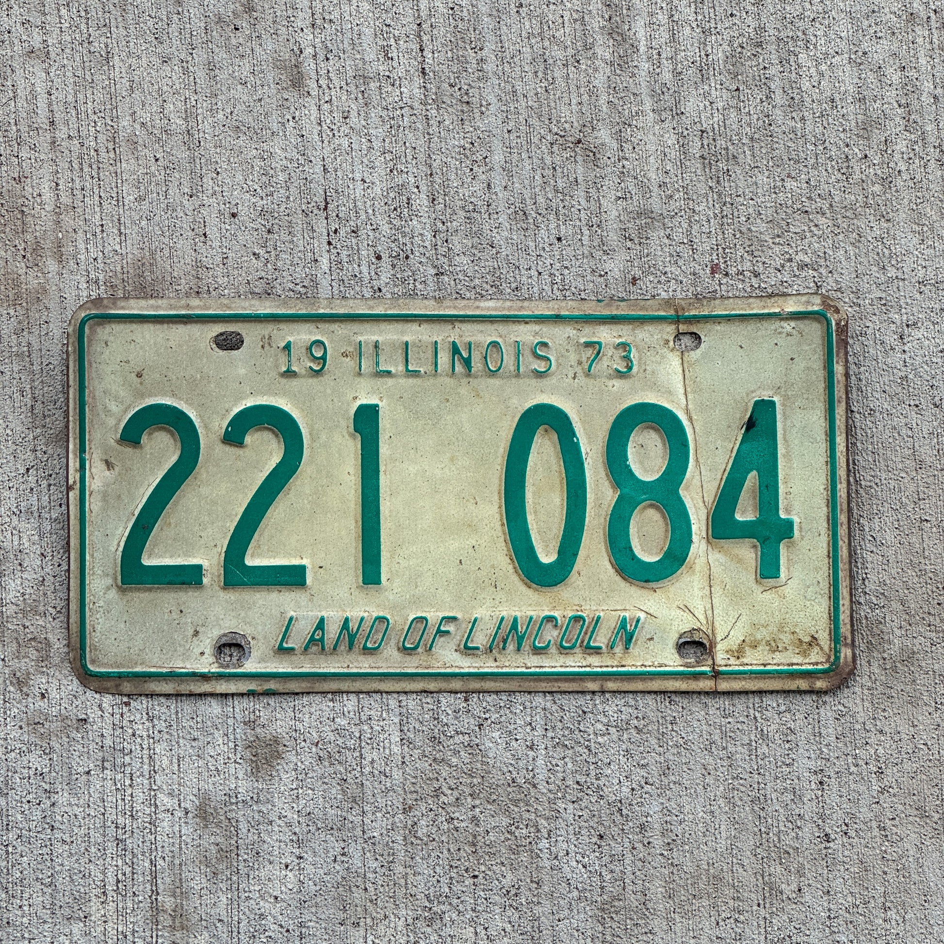 Photo of a 1973 Illinois License Plate Auto Tag 2 Vintage Garage 221 084 with original patina
