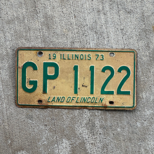 Photo of a 1973 Illinois License Plate Auto Tag 2 Vintage Garage GP 1122 with original patina